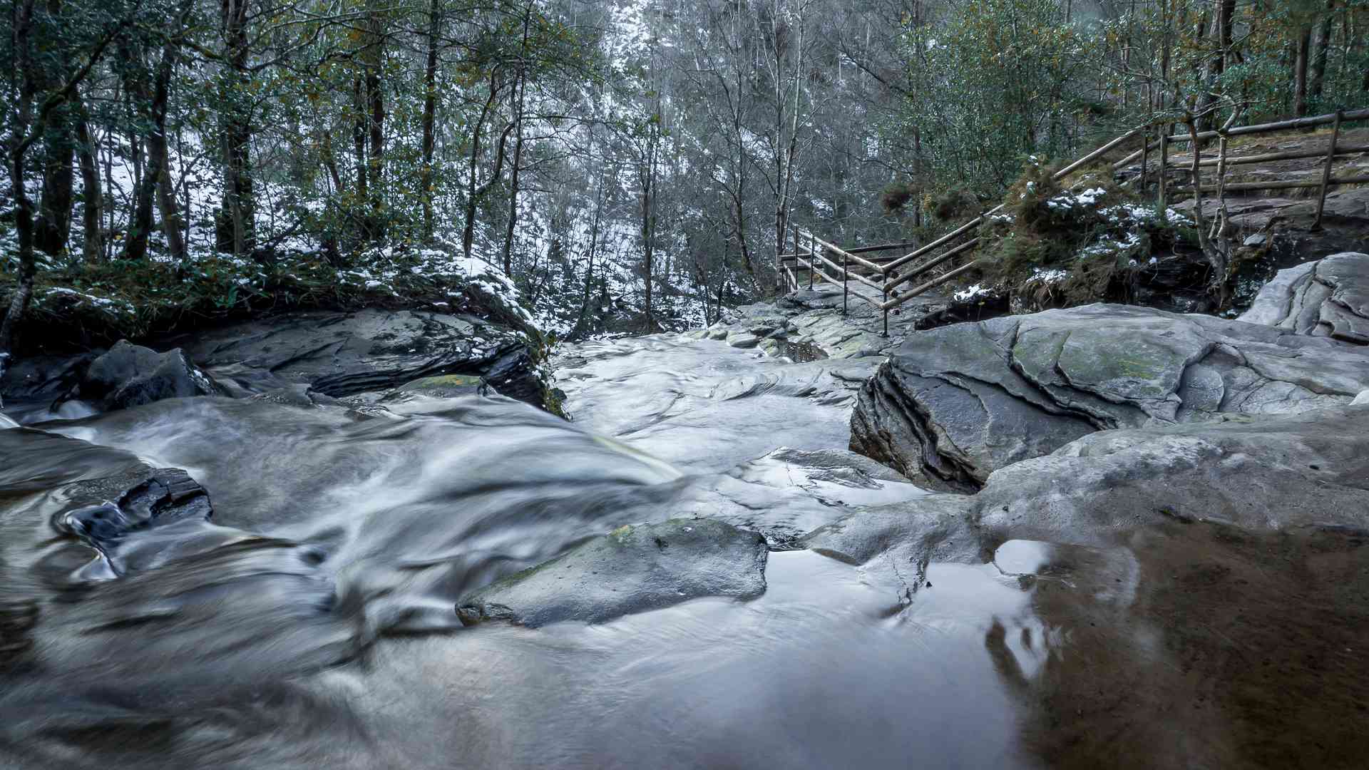Waterfall in winter with snow